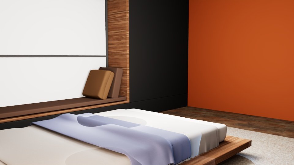 Bed against an orange accent wall