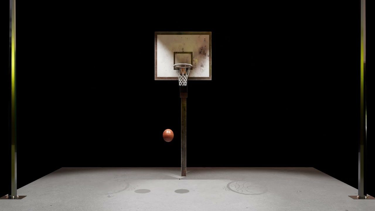 Basketball hoop under a single overhead light