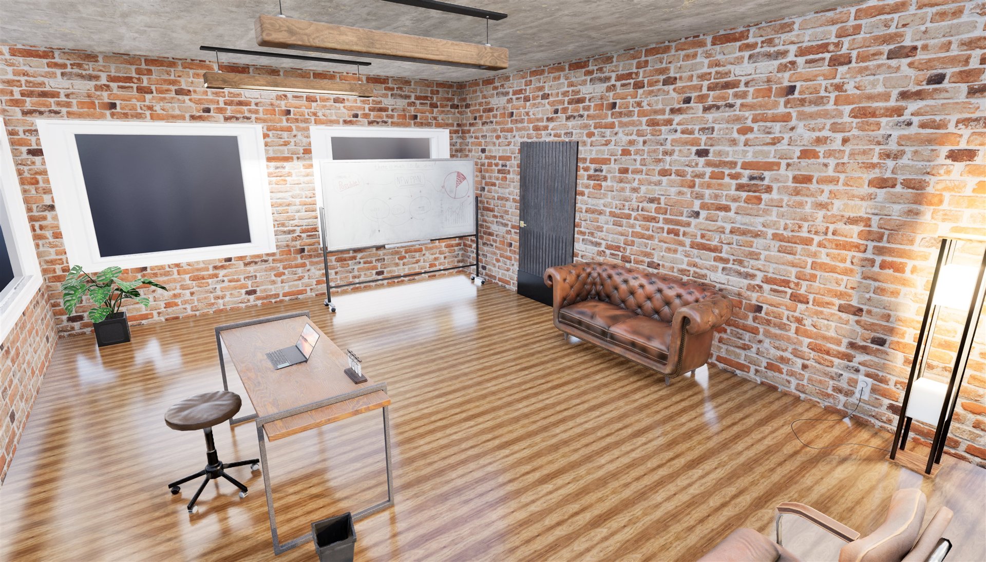 Brick-walled loft office with a desk and leather sofa